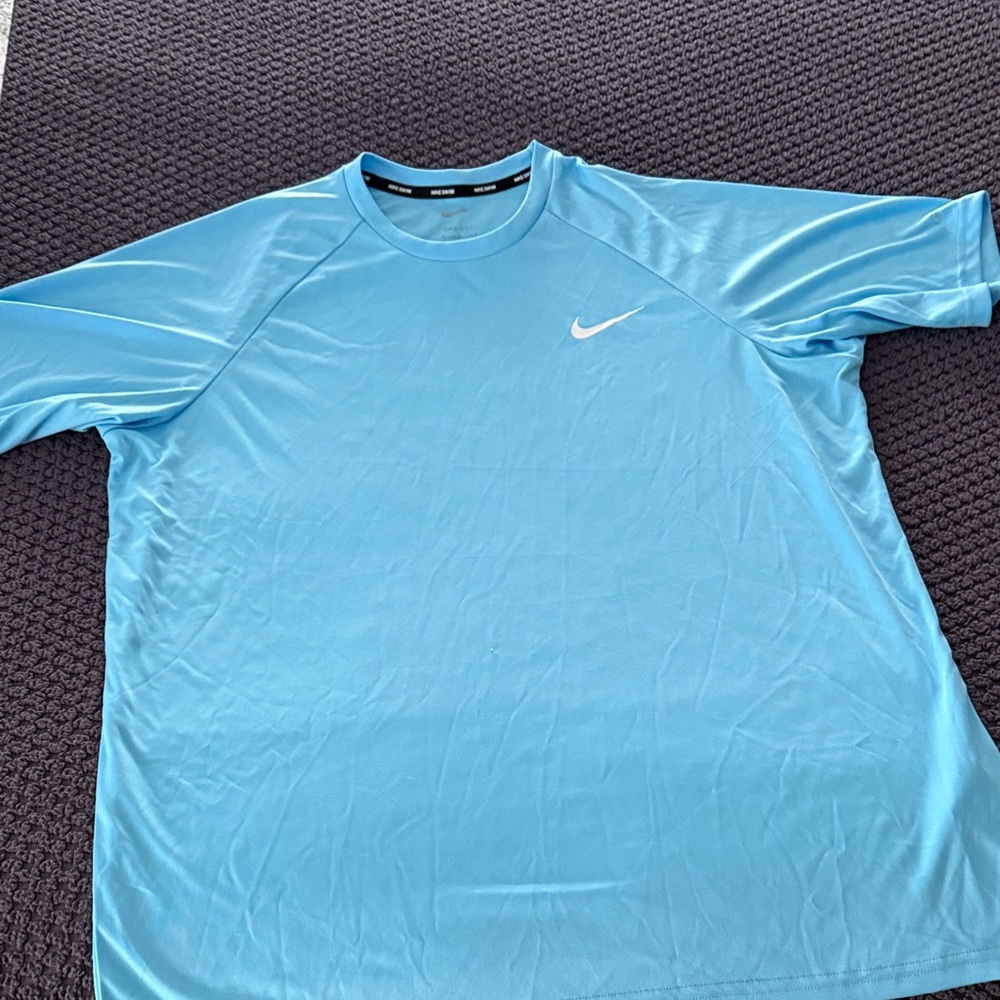 Nike Light Blue Short Sleeve Athletic Tee with White Swoosh